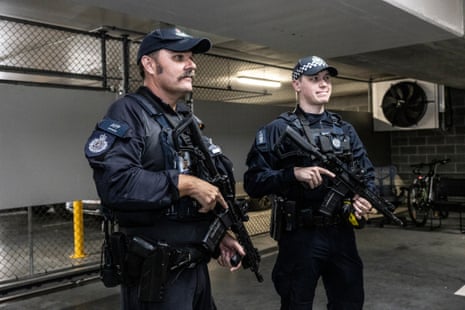 Two male AFP snipers holding guns