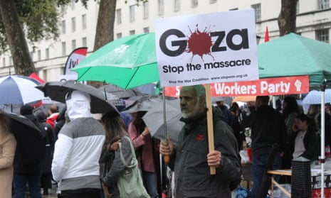 People holding placards in Whitehall.
