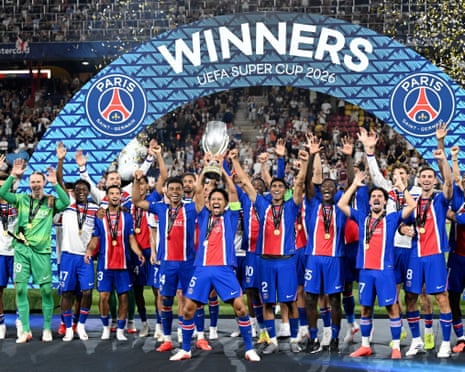 Paris Saint-Germain's Marquinhos lifts the Super Cup.