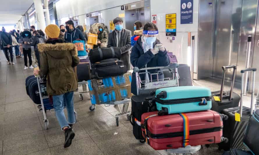 ‘This reversal in migration trends has been large, real and abrupt.’ People queue to enter the departure area at Heathrow Airport on 21 December 2020.