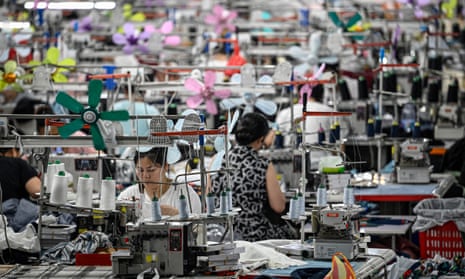 Workers producing garments at a textile factory that supplies clothes to fast fashion e-commerce company Shein in Guangzhou.