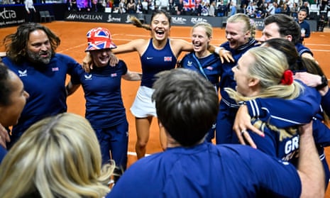 Emma Raducanu is all smiles with the Great Britain team after sealing victory over France