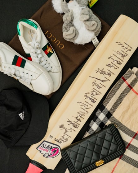 Items left behind by travellers, including sneakers and a signed cricket bat.