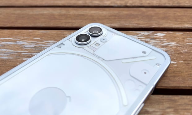 A photo showing the cameras and other design elements on the Nothing Phone 1’s transparent back.