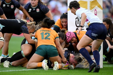Kelsey Clifford scores England’s fifth try against Australia.