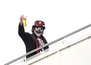 A Bournemouth fan enjoys a beer before kick off at halloween at The Vitality Stadium before watching his team loose 1-0 to Chelsea.