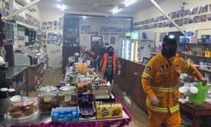 David Bruggeman took this photo of his store in Wingello as he escaped from a bushfire on Saturday night