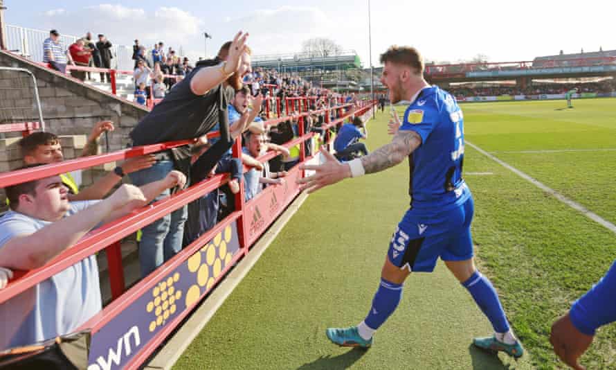 Football League roundup: Sheffield Wednesday climb into top six with win | Football League 1 Charlie Kelman celebrates his opener with Gillingham fans.