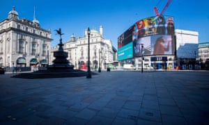 A deserted Piccadilly Circus during morning rush hour in central London on Thursday.