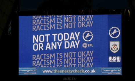 A message on the large screen reads ‘Racism is not ok. Not today or any day during’ during a Carabao Cup match.