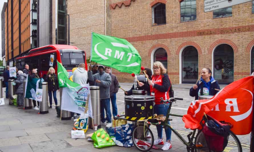 RMT members protest outside St Pancras station during a Tube strike in London on 6 June 2022.
