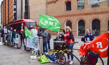 RMT members protest outside St Pancras station during a Tube strike in London on 6 June 2022.