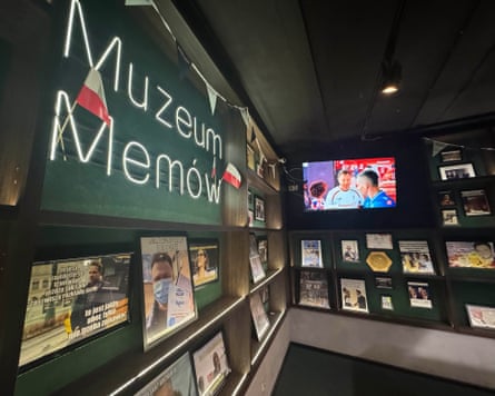 Walls covered with framed 'meme' images