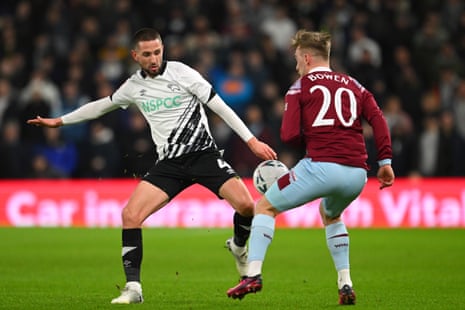 Conor Hourihane of Derby County tries to get a foot on the ball.