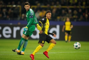 Borussia Dortmund’s Pierre-Emerick Aubameyang beats Hugo Lloris but misses the target.