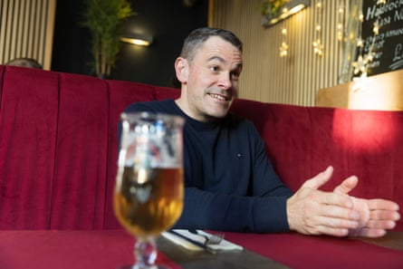 Martyn mid-conversation at a restaurant table