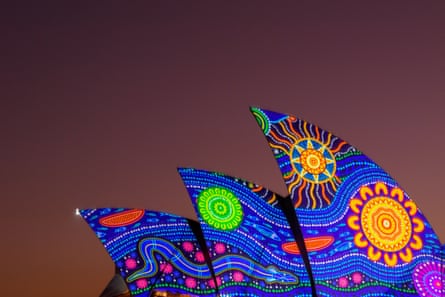 Kamilaroi artist Rhonda Sampson’s ‘Diyan Warrane’ artwork is projected onto the sails of the Sydney Opera House at dawn.