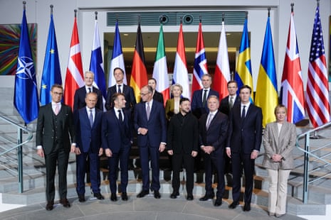 Leaders pose for a family photo at the Chancellery in Berlin, where they meet for talks on how to end the grinding war of Russia with Ukraine.