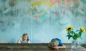 Milla, seven, and Ossian, four, in front of Lee Herringâs graffiti wallpaper from their company, feathr.com.