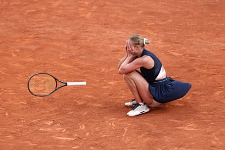 Anastasia Potapova covers her face with her hands after beating Coco Gauff in the French Open