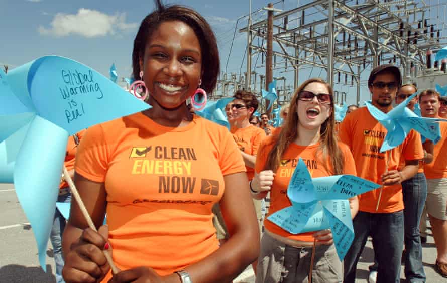 University of Miami students and Florida residents demonstrate their support for clean energy legislation by holding pinwheels at an electrical substation near campus just before President George W. Bush and Sen. John Kerry met on campus in the first debate of the campaign season, 2004