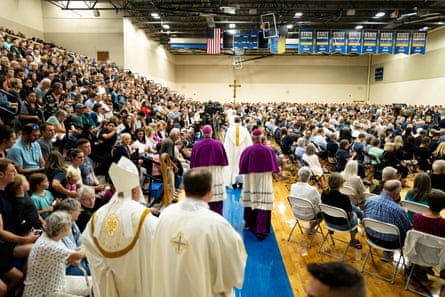 Members of the Catholic clergy arriving at a vigil on Wednesday for the victims of the shooting.