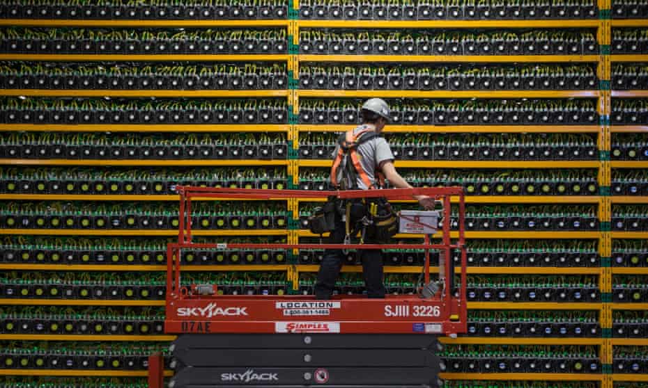 A bitcoin mining technician at Bitfarms in Saint Hyacinthe, Quebec. 