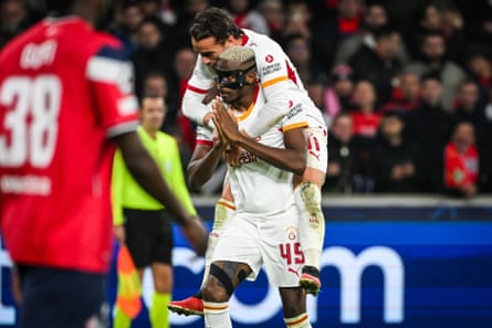 Victor Osimhen, with Yunus Akgun on his shoulders, after rounding off Galatasaray’s 4-2 win at Lille