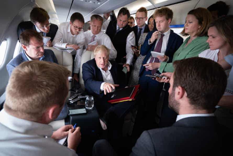 Boris Johnson talking to journalists during his flight yesterday from Germany to Madrid, where he is today attending the Nato summit.