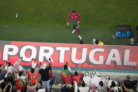 Portugal’s Cristiano Ronaldo prepares come on against Switzerland at the 2022 World Cup
