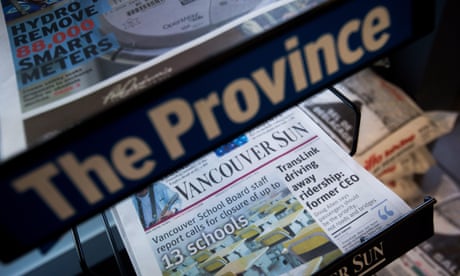 Copies of Postmedia-owned newspapers the Vancouver Sun and the Province are displayed at a store in Burnaby, Canada, Tuesday, Jan. 19, 2016. Postmedia has cut approximately 90 jobs and merged newsrooms in four cities as it steps up plans to slash costs amid mounting revenue Postmedia has cut approximately 90 jobs and merged newsrooms in four cities as it steps up plans to slash costs amid mounting revenue losses, according to the Canadian Press. (Darryl Dyck/The Canadian Press via AP) MANDATORY CREDIT
