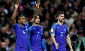 Luciano Narsingh celebrates scoring the second goal for Holland.