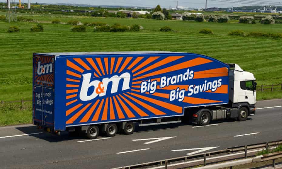 A B&M lorry driving along a motorway.
