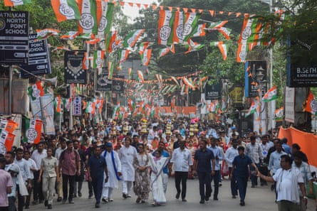 Mamata Banerjee, chief minister of West Bengal and leader of the All India Trinamool Congress, participates in a roadshow from on 18 April.