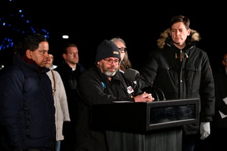 Darryl Krakowka at a lectern in a press conference.