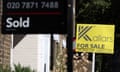 Signs mark homes being sold or available for sale in London