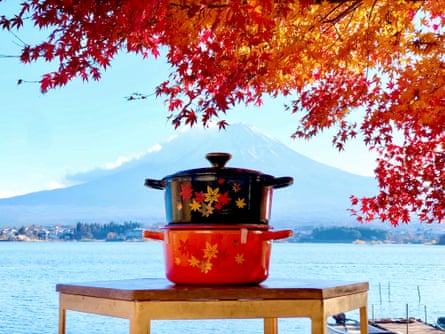 two pots on a table with mt fuji in the background
