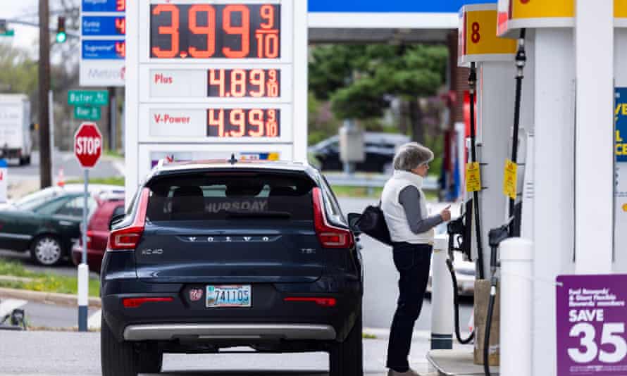 Shoppers purchase gasoline at a Shell station in Bethesda, Maryland, this week. The Ukraine war has contributed to a sharp rise in gas prices.