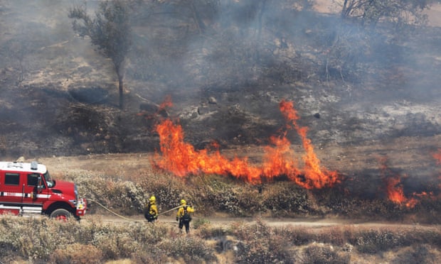 'Apple Fire' in Riverside County, California<br>epa08581237 Firefighters work to extinguish the 'Apple Fire', near Beaumont, in Riverside County, California, 02 August 2020. EPA/DAVID SWANSON