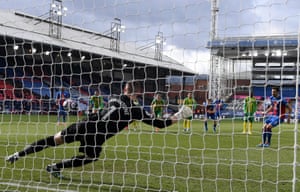 Crystal Palace’s Luka Milivojevic sends Baggies keeper Sam Johnstone the wrong way to open the scoring..