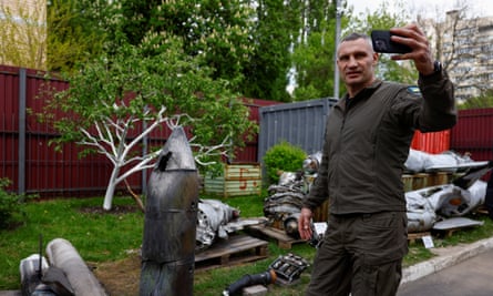 Kyiv mayor Vitali Klitschko holds up a Kh-47 Kinzhal Russian hypersonic missile warhead in Kyiv.