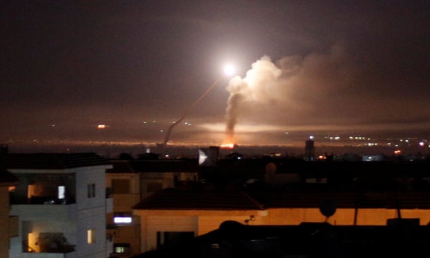 Missile fire is seen from Damascus, after Israel responded to a rocket attack on the Golan Heights with strikes inside Syria.