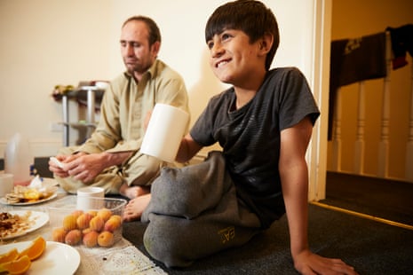 Norzai and Wali Khan break their Ramadan fast at the end of the day at their home in Derby