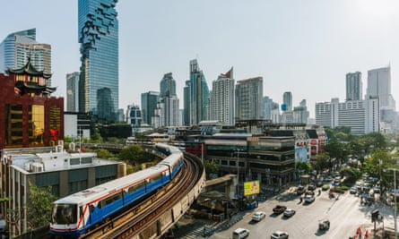 A train running through central Bangkok, Thailand