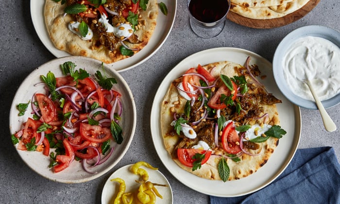 Spiced lamb flatbreads with a garlicky tomato salad recipe