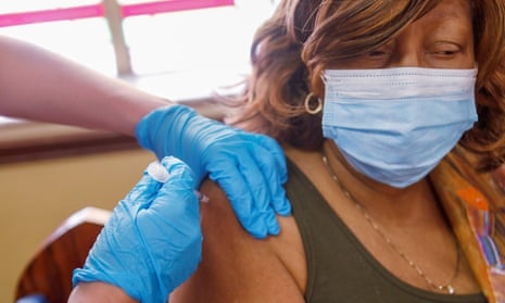 A woman receives the Pfizer-BioNTech Covid-19 vaccine in Tampa, Florida.