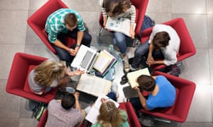Students studying  in a circle
