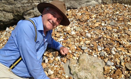 Fortey on the Isle of Wight with a dinosaur footprint, photographed while filming Fossil Wonderlands for the BBC in 2013.