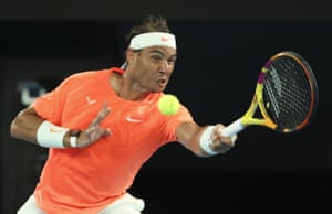 Nadal hits a forehand return to Tsitsipas
