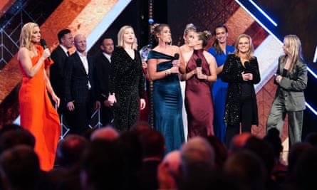 Gabby Logan (left) interviews the England women's football team and manager Sarina Wiegman